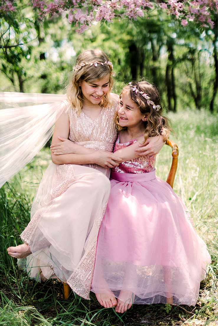 Portrait of two sisters in pink dressed taken by Philadelphia family photographer