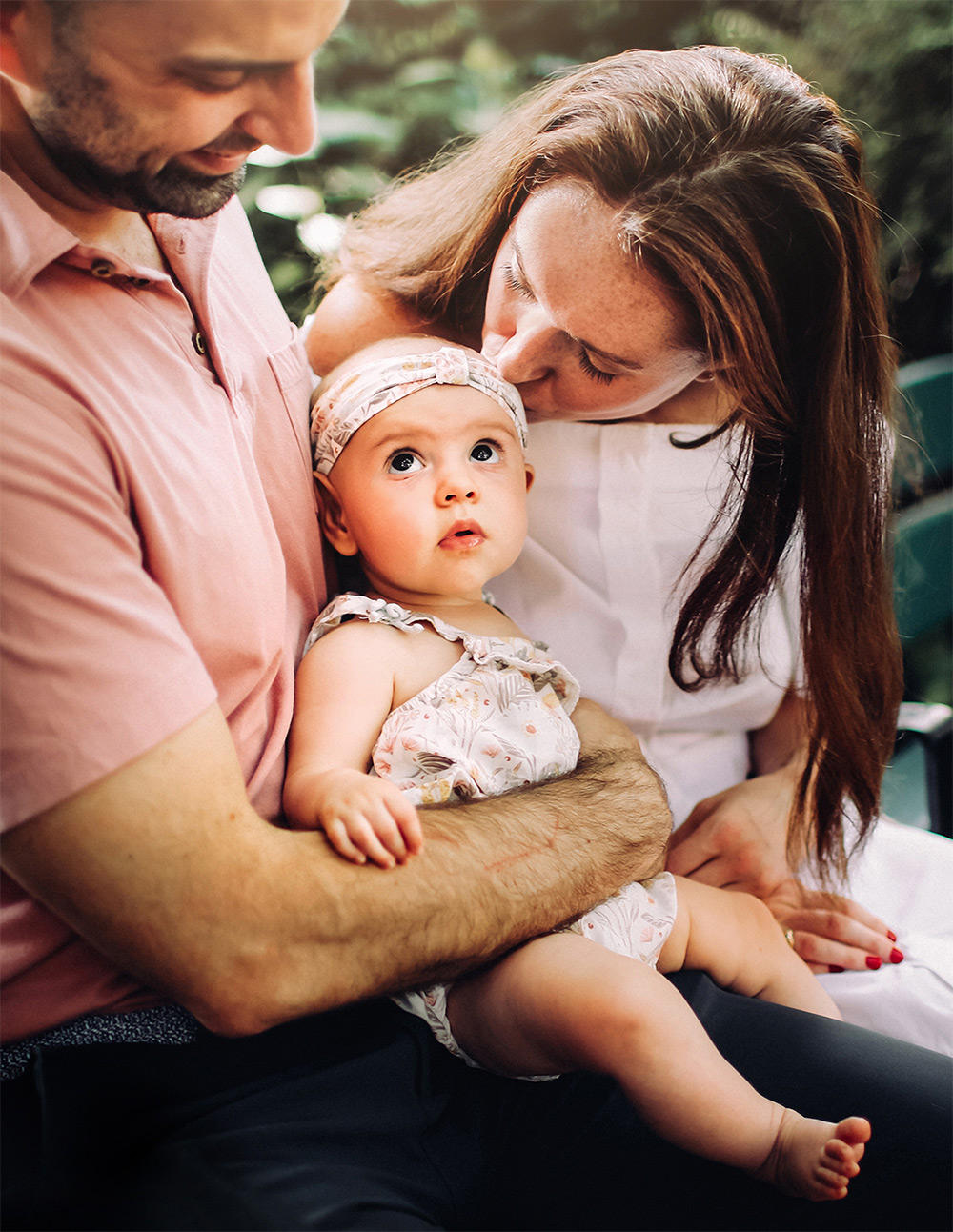 Portrait of parents with baby by Philadelphia family photographer