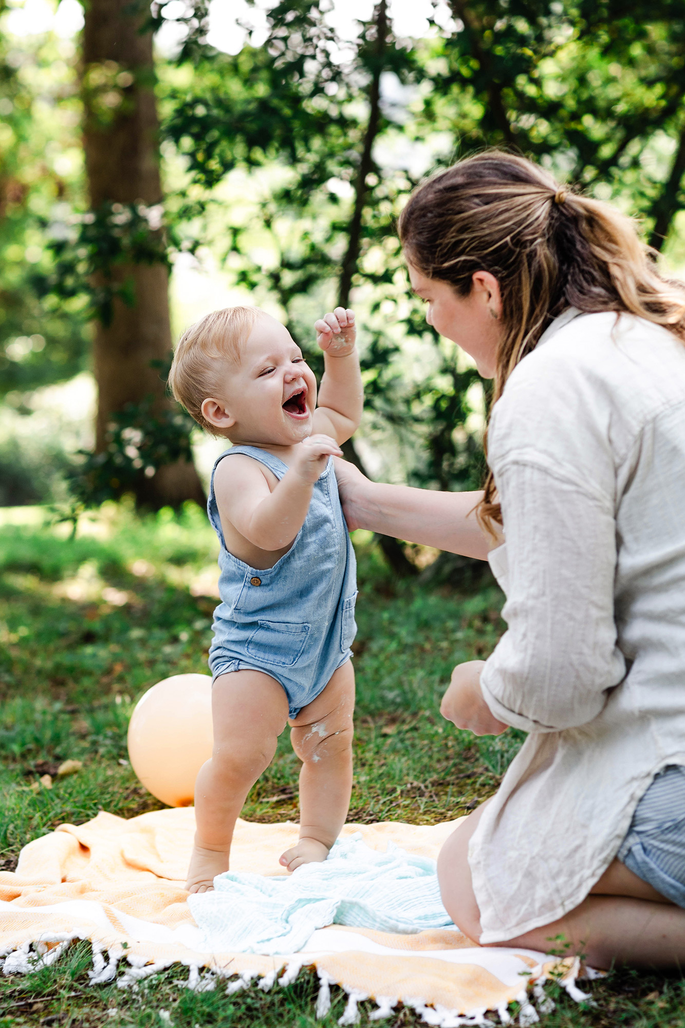 baby trying to walk to mom