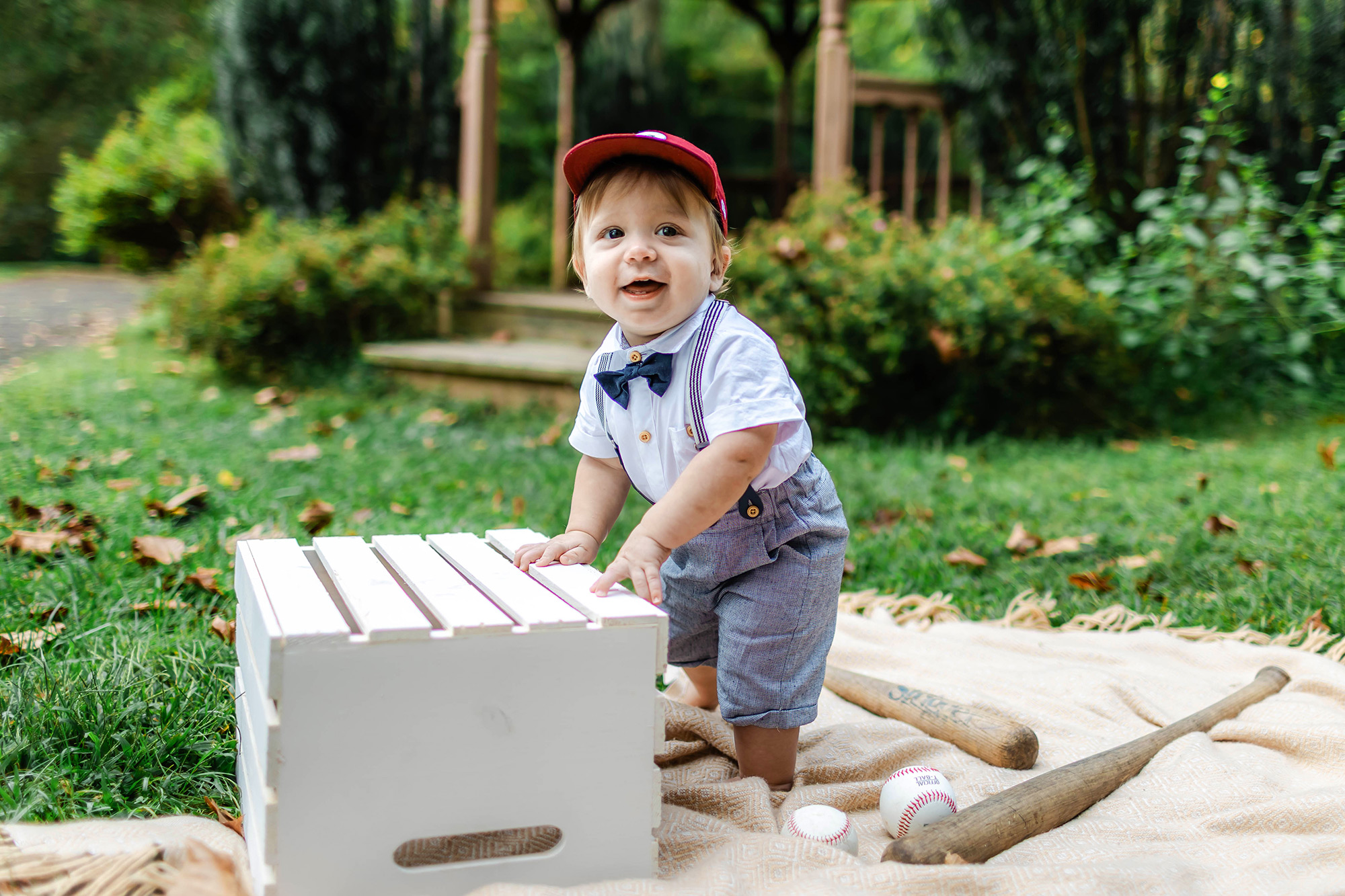 baby wearing Phillies hat