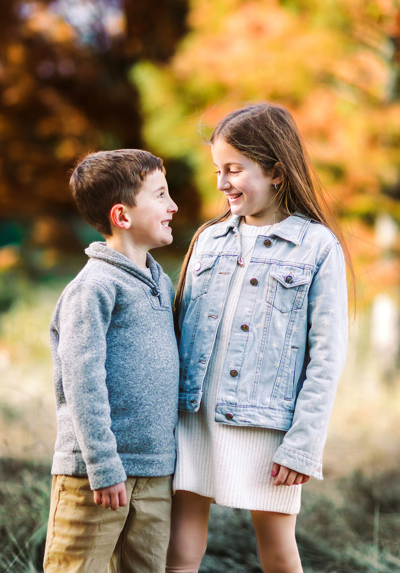 brother and sister in a colorful fall park