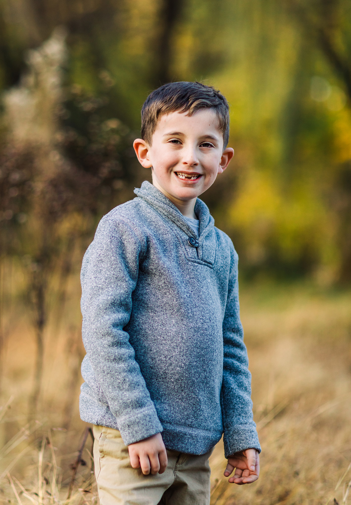 portrait of a young boy in the fall