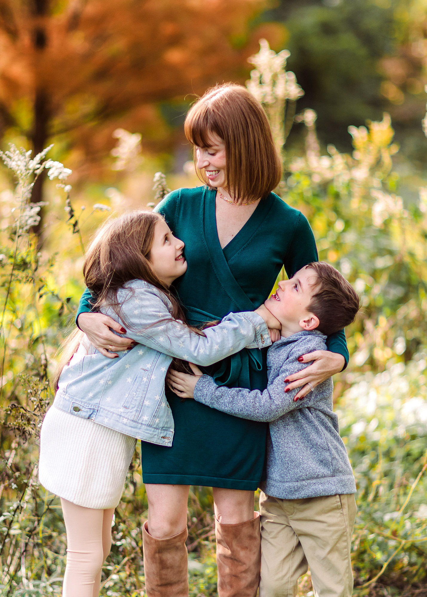 fall outdoor photo of a mom with her two kids