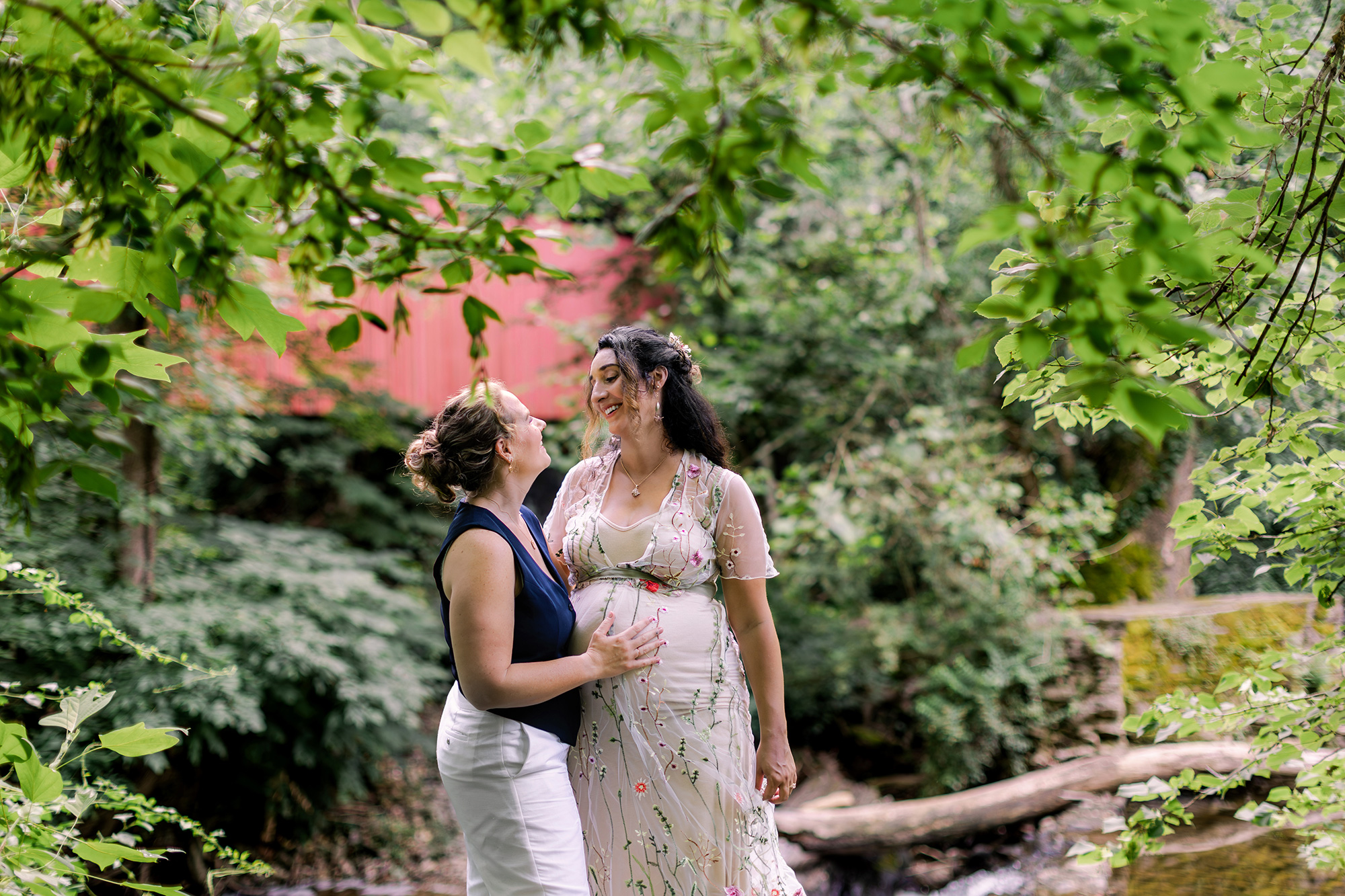 Two brides by Wissahickon Valley creek